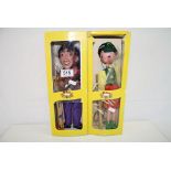 Two boxed Pelham Puppets to include SS4 Tyrolean Boy and SL16 Guitarist in fair condition with boxes