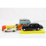 Three boxed/ cased Dinky diecast models to include 113 MBG Sports Car in white with driver (