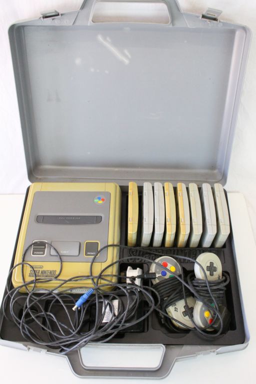 Retro Gaming - Super Nintendo Entertainment System SNES console with 2 x controllers, 8 x games