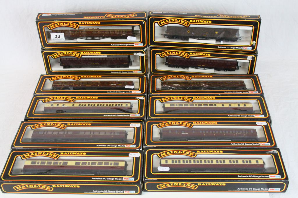 12 Boxed Palitoy Mainline OO gauge items of rolling stock to include 37111 x 2, 37109 x 3, 37110 x