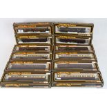 12 Boxed Palitoy Mainline OO gauge items of rolling stock to include 37111 x 2, 37109 x 3, 37110 x