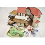 Collection of original Bluebird Sylvanian Families to include figures, traditional bus and large