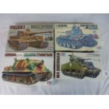 Four Tamiya 1:35 Scale model military vehicles to include No.190 M4 Sherman Tank (Early Production),
