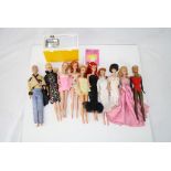 Nine original Mattel Barbie dolls in original clothing, condition is good overall, plus a Mattel Ken