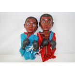 Two Cassius Clay / Muhammad Ali boxer puppets in rock em sock em style, one red, one blue in gd