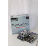 Retro Gaming - Boxed Playstation dual shock console with controller and power cables, plus 7 x games