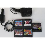 Five Sega Game Gear game cartridges to include WWF Wrestlemania Steel Cage, World Cup Soccer,