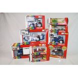 Nine boxed 1:32 Britains farming vehicles to include 9527 Ford 5610 Tractor, 9518 Renault TX 14514