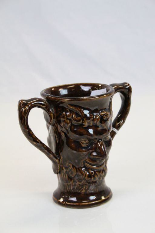 19th century treacle glaze loving cup decorated with two faces of Bacchus - Image 2 of 5