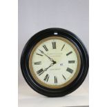 A vintage style wall clock Lacelles clock maker London battery movement.