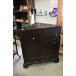 Georgian Oak Floorstanding Corner Cabinet, the single panel door opening to reveal three shaped