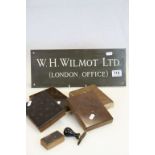 A vintage brass plaque W H Wilmot London Office a quantity of print blocks and and stamp.