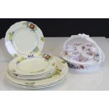 A vintage Spode egg cups and stand with floral decoration and 8 Royal Doulton plates.