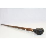 Hardwood walking Sticj with Ebony African head knopp, approx 90cm long in total