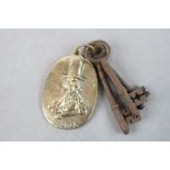 Large brass Brunel keyring with keys.