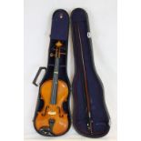 A cased students violin and bow.