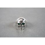 Silver Skull Shaped Ring with Emerald Eyes