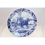 A large contemporary Delft charger decorated with pony and trap.