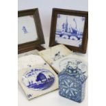 Seven 18th Century Delft blue & white Tiles with various scenes to include; Sailing Ships, Church,