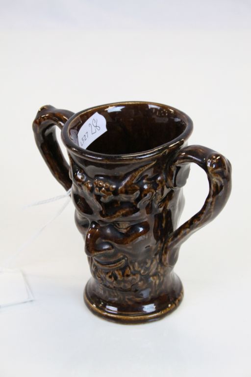 19th century treacle glaze loving cup decorated with two faces of Bacchus - Image 4 of 5