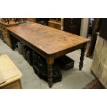 Large Stained Pine Kitchen Table on Turned Legs, 229cms long x 105cms wide x 77cms high