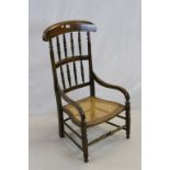 Late Victorian Stained Beech Low Elbow Chair with double turned spindle back and cane seat