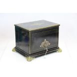19th Century French Tantalus, inlaid brass and mop and boule work, fitted ormolu interior, raised on