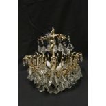 A Cast brass chandelier with glass drops