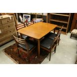 Mid 20th century Retro Teak Extending Dining Table together with Five Matching Chairs and one