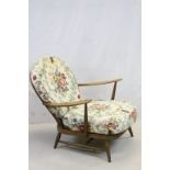Mid 20th century Ercol Style Low Armchair with Spindle Hoop Back and Cushion Seat and Back