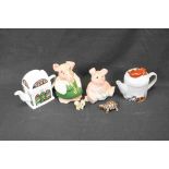 Two Wade pig money banks , two Wade teapots and a dog and tortoise.