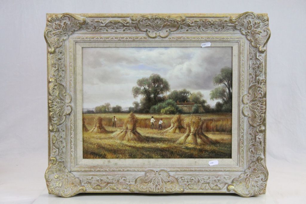 Ornate Gilt framed oil on canvas depicting a Harvest scene and signed "T Roberts", measures approx