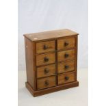 Hardwood Bank of Eight Short Drawers with Turned Handles, 66cms high x 31cms deep x 76cms high