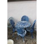 Set of cast aluminium patio table set to include 4 chairs