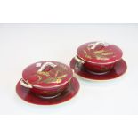 A pair of Worcester lidded two handled bowls on saucers with gilt wheat pattern marked to base