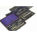 Two vintage cased precision drawing sets to include compasses etc.
