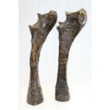 Vintage pair of ornately carved African animal Leg bones depicting Tribal scenes and each approx