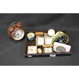 Collection of travel alarm clocks including Fabre Leuba, Smiths, Loopins, Danuvia, Baduf etc