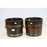 A pair of vintage brass bound coopered planters by A Lister and Co.
