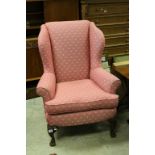 20th century Georgian Style Upholstered Wing Back Armchair raised on Carved Cabriole Front Legs