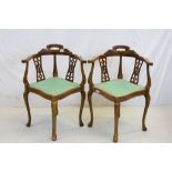 Pair of Edwardian Mahogany String Inlaid Corner Tub Chairs, each with Shaped Back, Carved Pierced