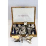 An oak cased Mappin and Webb cutlery box containing a mixed quantity of flatware.