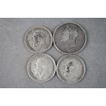 A 1821 George IIII Silver Crown coin together with three George V Half Crown coins.