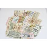 A collection of approx 34 world banknotes to include examples from Turkey, United States of America,