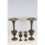 Two pairs of Middle Eastern Bronze Vases with Black Enamel decoration, the tallest pair approx 44cm