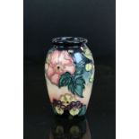 Small Moorcroft ceramic Vase 1993 with Pansy decoration & signed to base