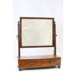 Mahogany and Satinwood dressing table swivel Mirror over two drawers on bun feet,