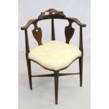 Late 19th / Early 20th century Corner Chair with Shaped Splats raised on turned legs