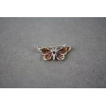 Silver and Enamel Plique a Jour butterfly brooch