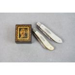 Two silver bladed fruit knives with mother of pearl handles and a Tunbridgeware stamp box.